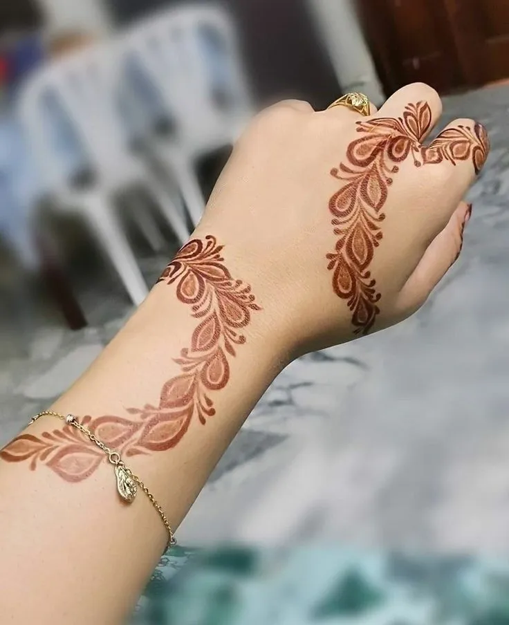 Bold floral hand henna