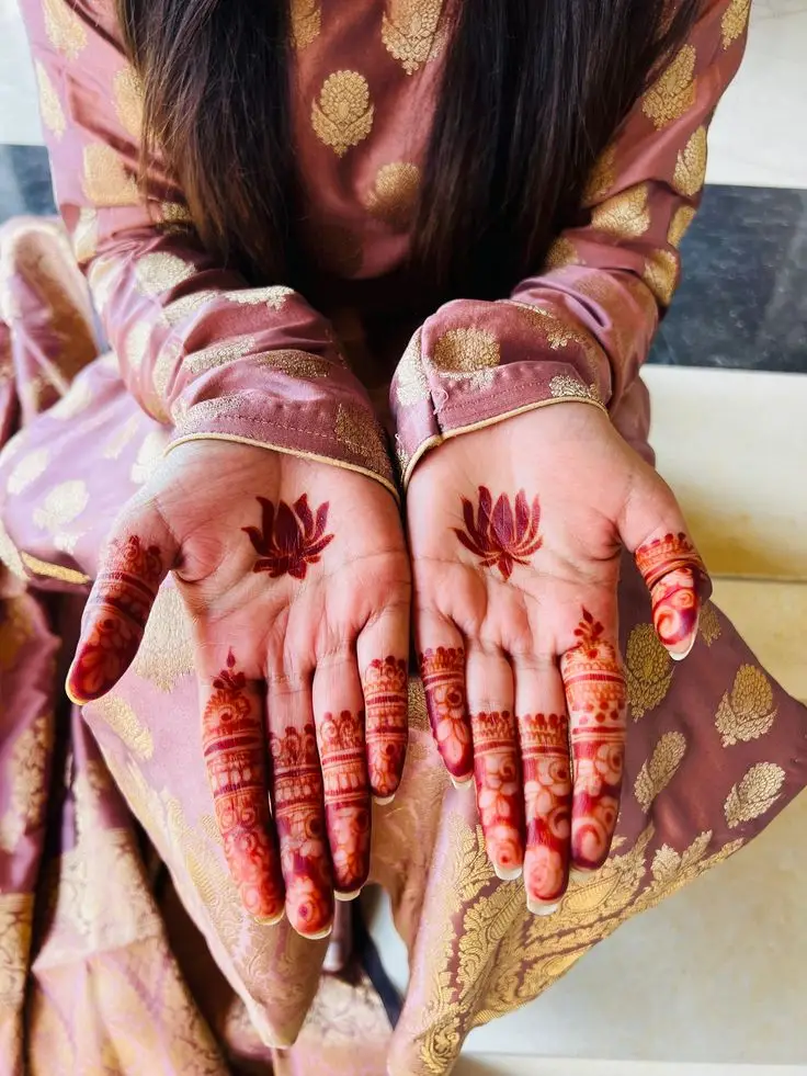 Modern flower mehndi for back hand