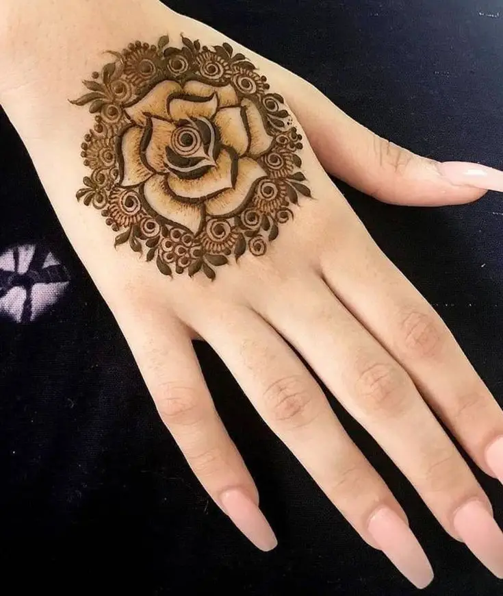 Rear Full Hand Bridal Mehndi Designs that incorporate Floral Elegance