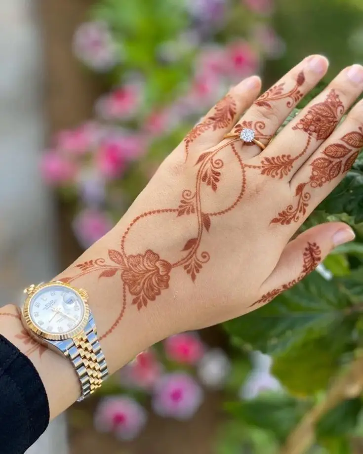 Simple Floral Design Mehndi with a few tiny flowers