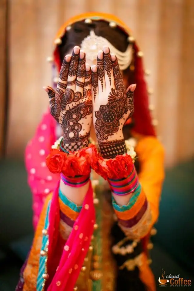 Wrist to back hand floral mehndi