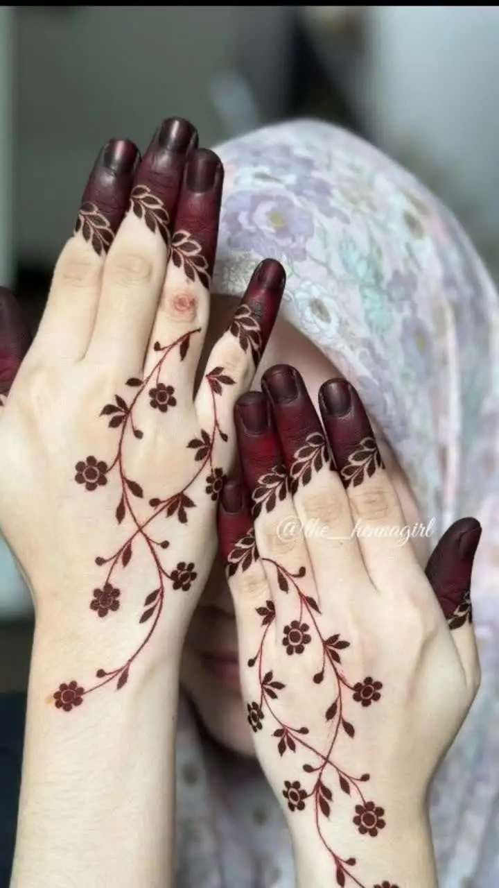 back hand rose mehndi design