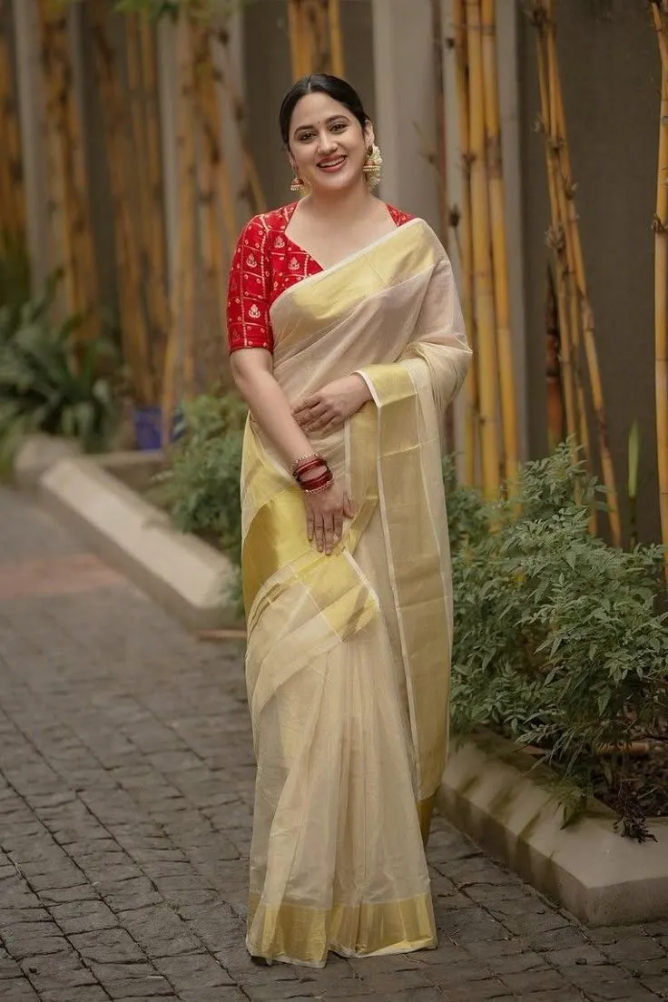 Kerala saree with green blouse neck designs