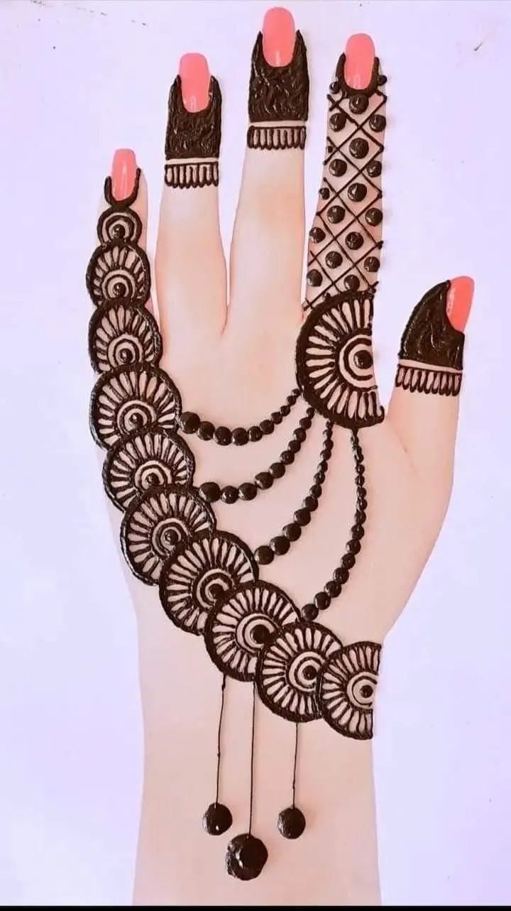 Ring finger mehndi design on back