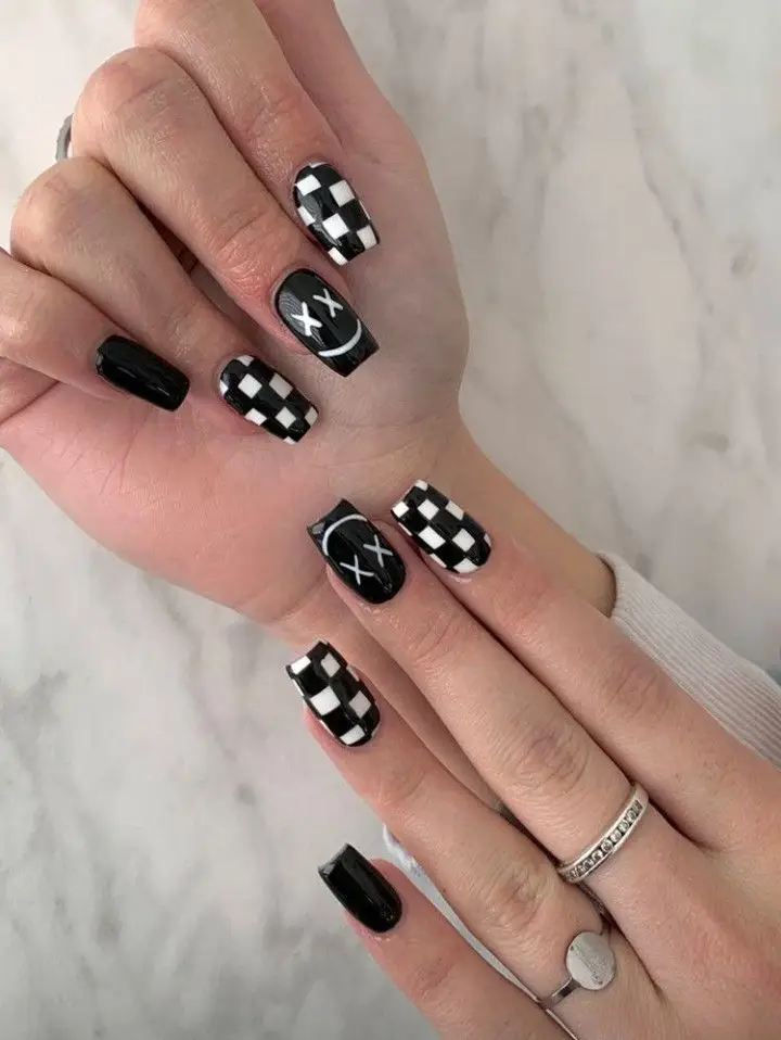black white polka dot nails
