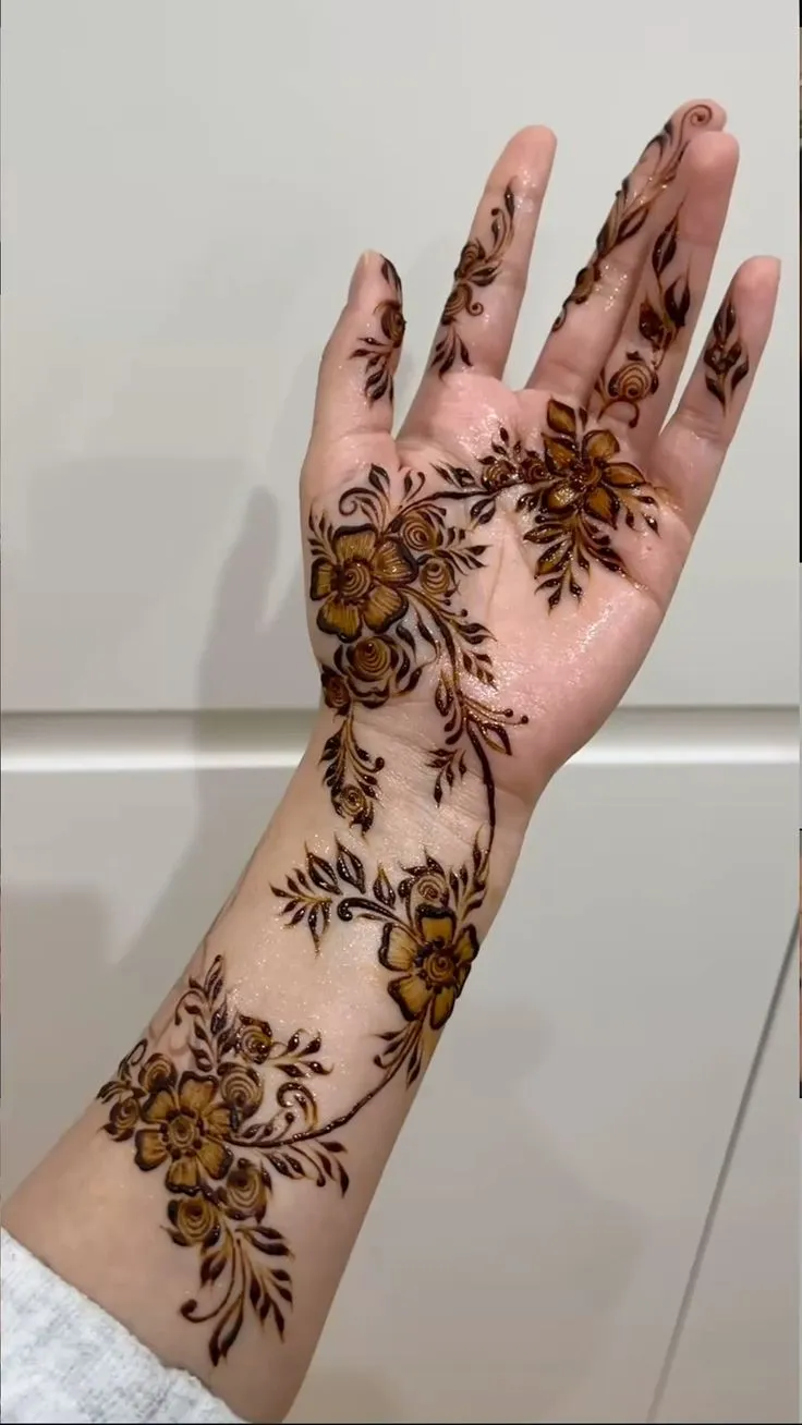 latest pakistani mehndi design for front and back hand