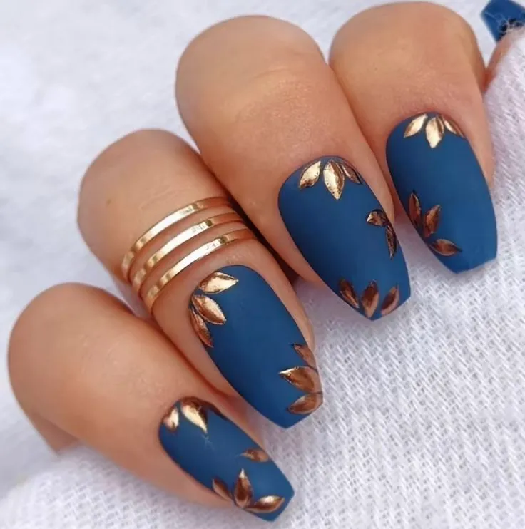 Blue and gold nail art