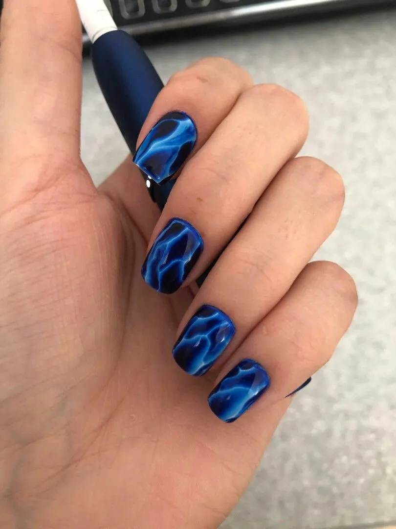 Blue glossy nails