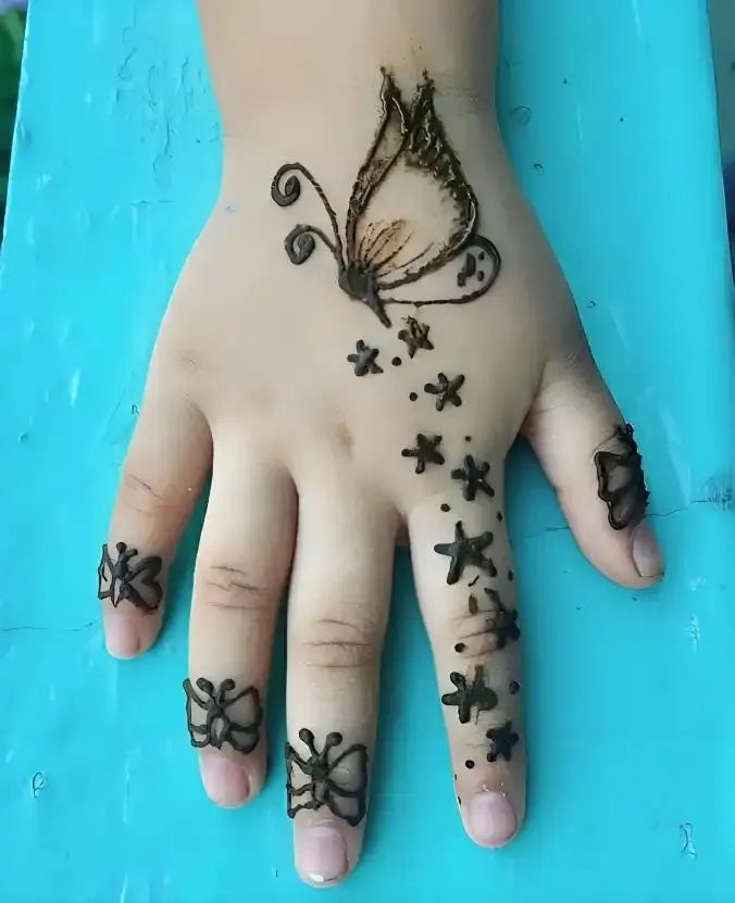 Children mehndi design butterfly motif on hand