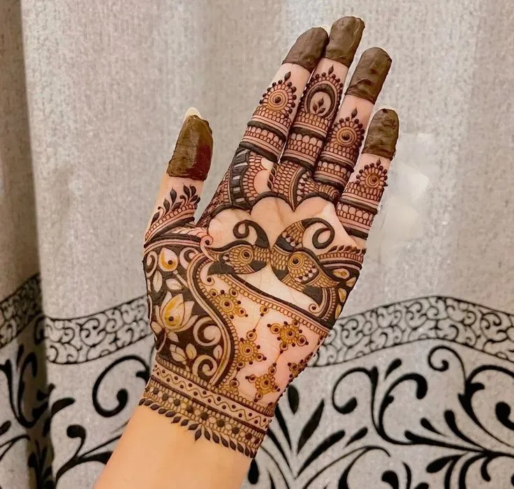 Contemporary royal mehndi for front hands