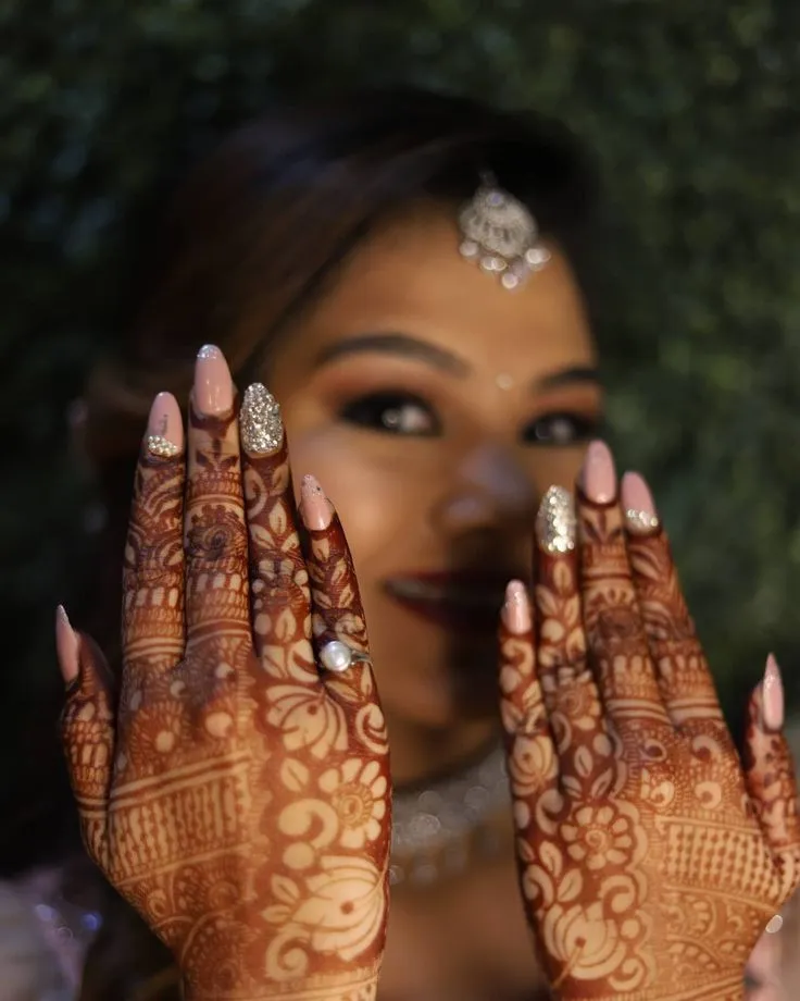 Detailed close up of bridal nail art designs
