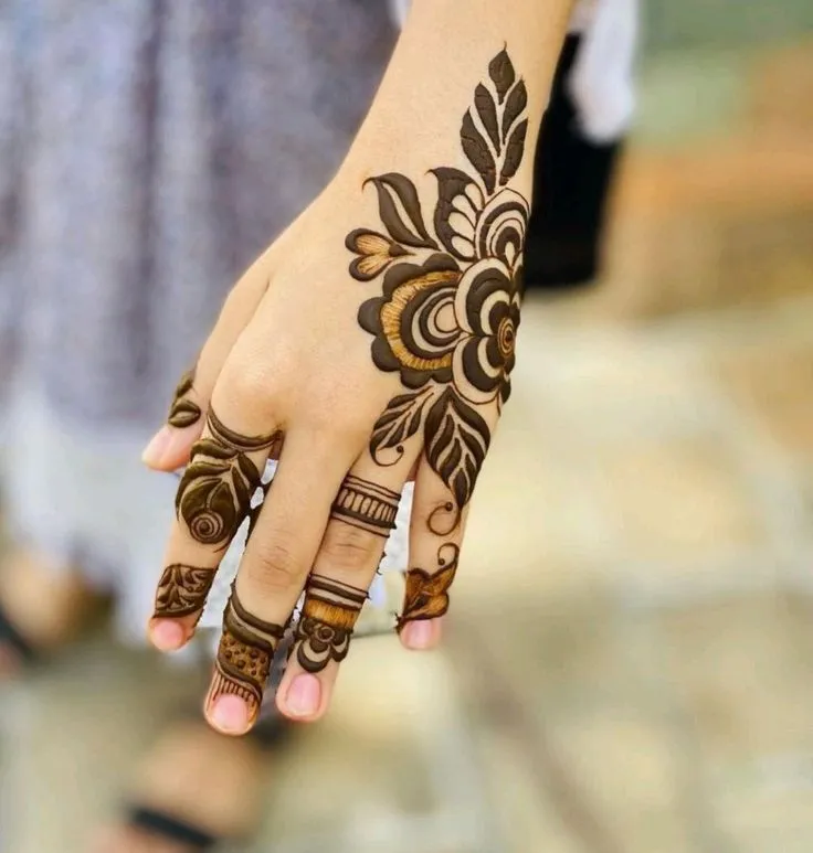 Mehndi design on back hand