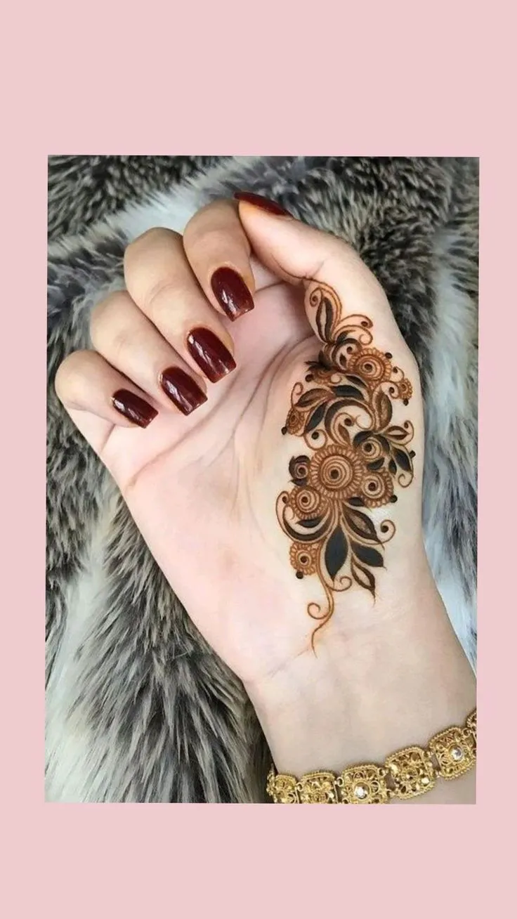Single rose on fingers