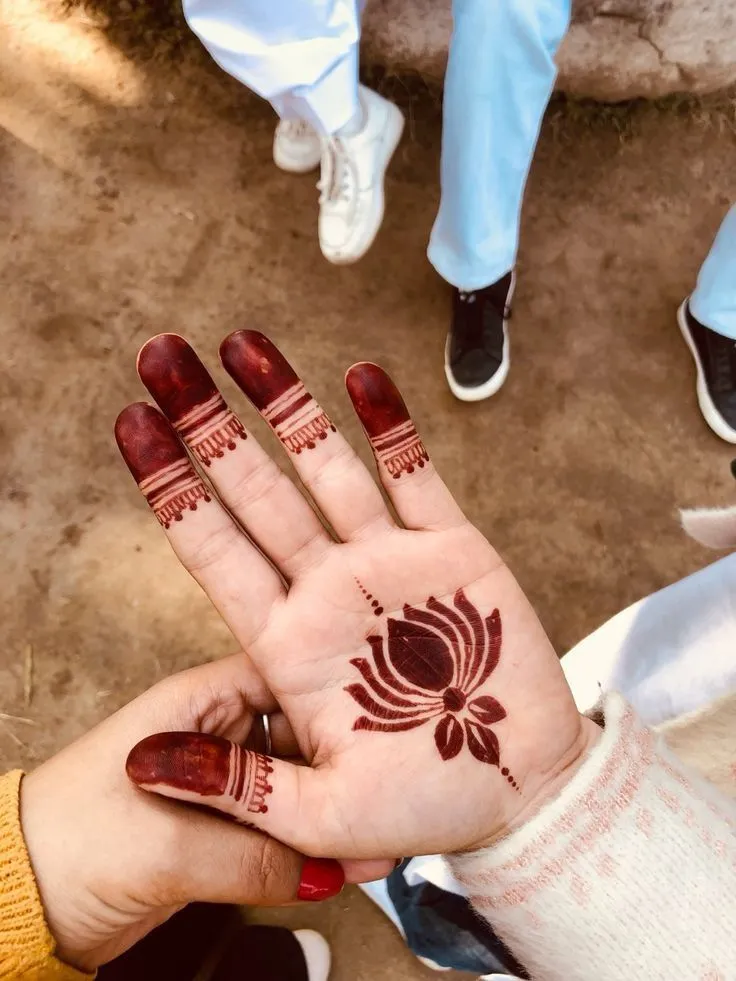 front hand rose mehndi design