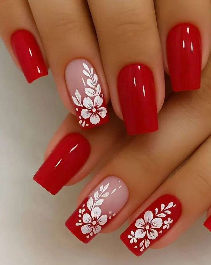 Red nails with flowers extensions